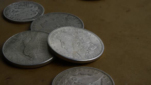 Rotating stock footage shot of antique American coins 