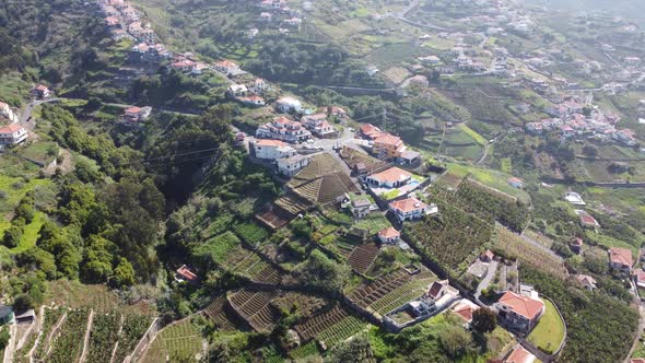 Looking down on houses and fields in Madeira. Shot on DJI.