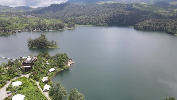 Aerial view of lake side with park and mountain in Bandung, Indonesia