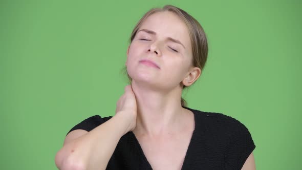 Young Stressed Businesswoman Having Neck Pain