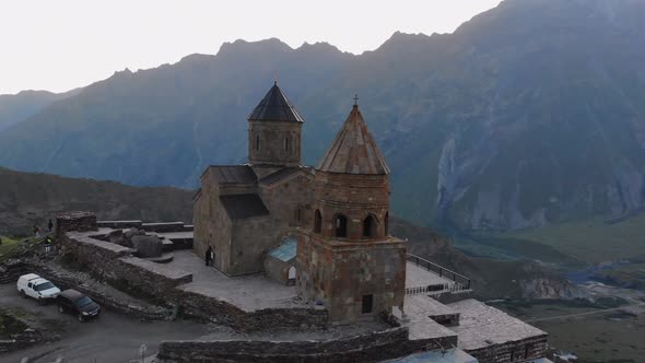 Aerial View At The Gergeti Trinity Church Tsminda Sameba