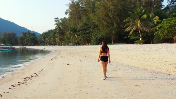 Beautiful ladies look beautiful on idyllic sea view beach adventure by blue water with white sand ba