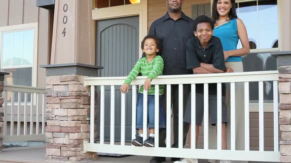 Happy African American family buy a house