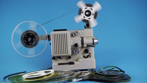 Rewinding Old Movies On Retro Movie Projector