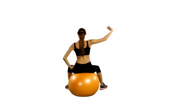 Fitness Girl Doing Fitness Exercise with Fitness-ball, Gym. White Background