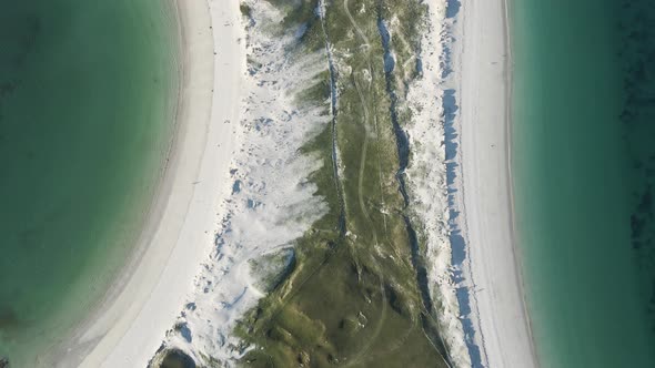 Scenic Aerial View Of Green Coast With White Sand At The Dog's Bay Beach In Roundstone, County Galwa