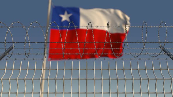 Barbed Wire Against Waving Flag of Chile