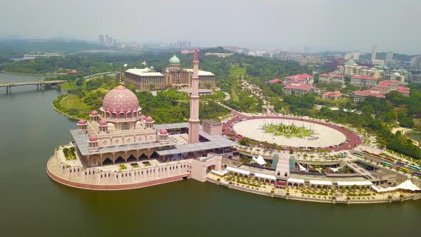 Aerial view of Putra mosque with garden landscape design and Putrajaya Lake, Putrajaya