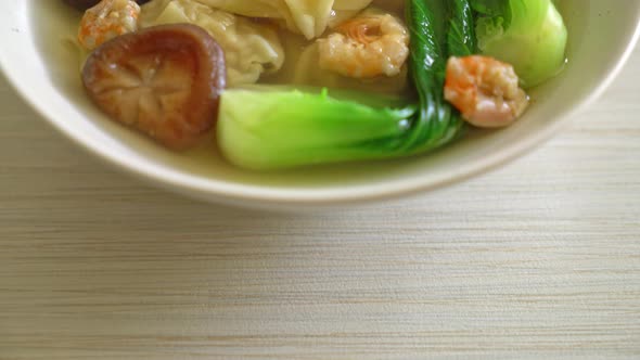 pork dumpling soup with shrimps and vegetable - Asian food style