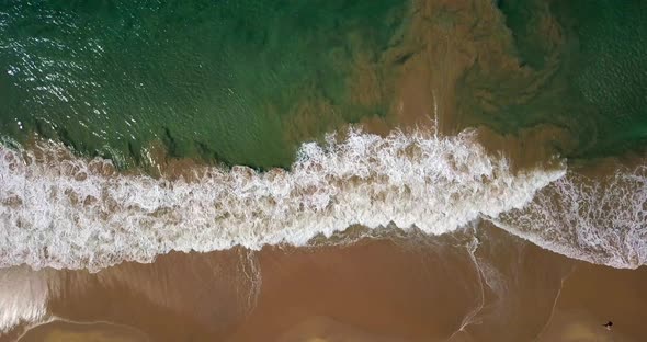 Tropical Landscape of Sand Beach and Sea Waves Rolling in