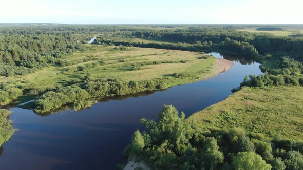 Forest River in the Summer Taiga From a Height of Flight