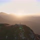Fly over mountain peak during sunset - VideoHive Item for Sale