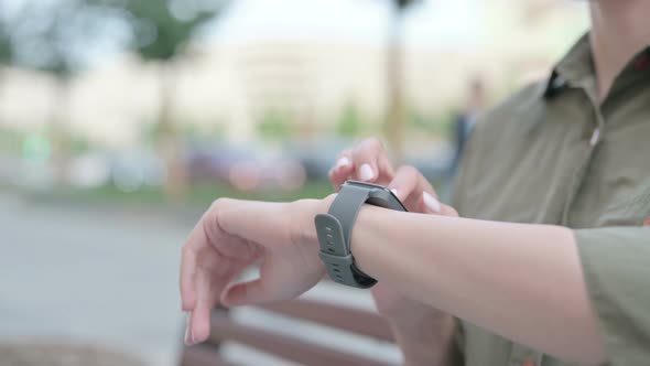 Close Up of Woman Using Smartwatch Outdoor