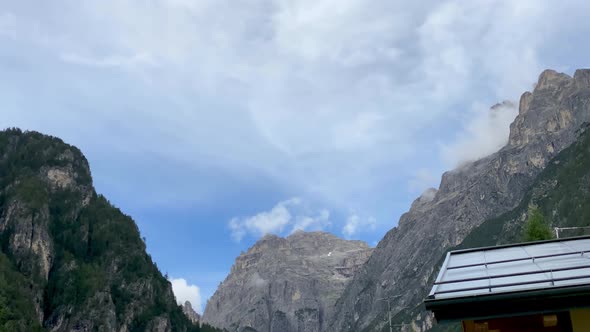 Time Lapse of Mountain Landscape with Moving Clouds