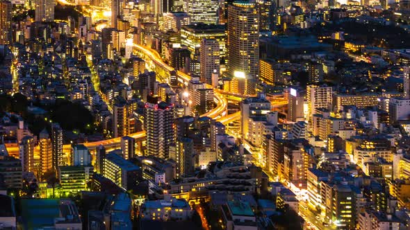 day to night time lapse of the Metropolitan Expressway road and city at Tokyo, Japan