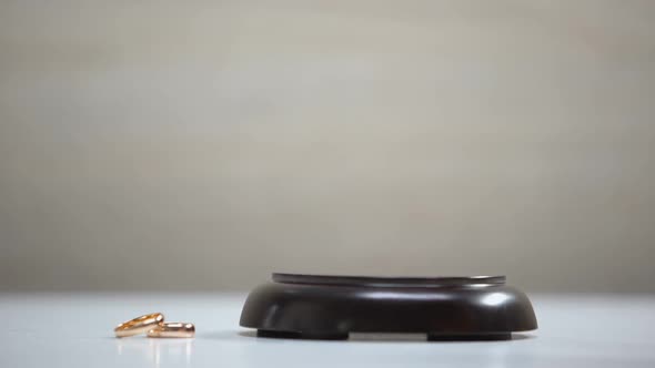 Wedding Rings on Table, Gavel Striking on Sound Block, Divorce Procedure, Court