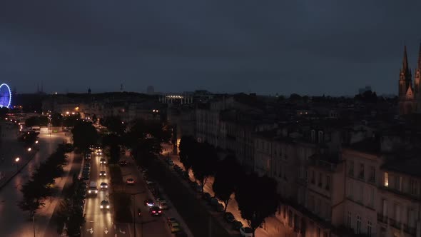 Bordeaux City Street at Night From Aerial Perspective with Church in Frame