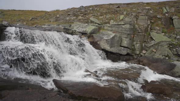 Beautiful View of Flowing River Water in Mountain