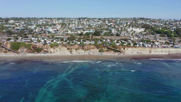 Drone shot flying towards Encinitas city and Cardiff-by-the-sea beach, America