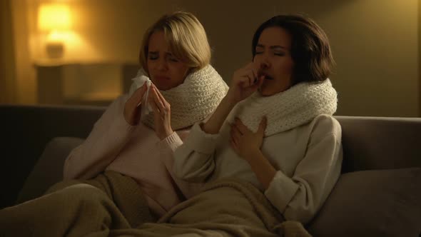 Ill Women Lying With Scarfs in Bed, Hardly Coughing and Sneezing, Flu Virus