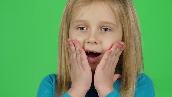 Close-up of Child Posing Shows Frightened Emotion. Slow Motion