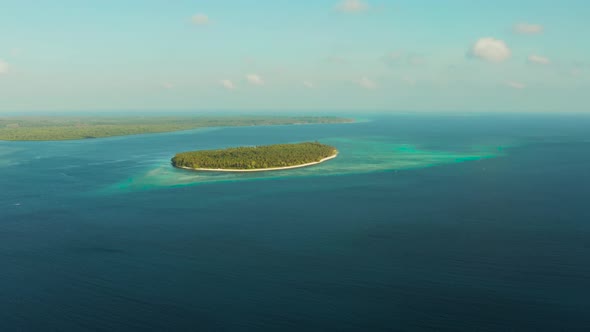 Tropical Islands with Beaches in the Blue Sea Balabac, Palawan, Philippines.