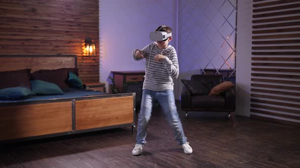 Joyful Teen in VR Goggles Performing Funny Dance