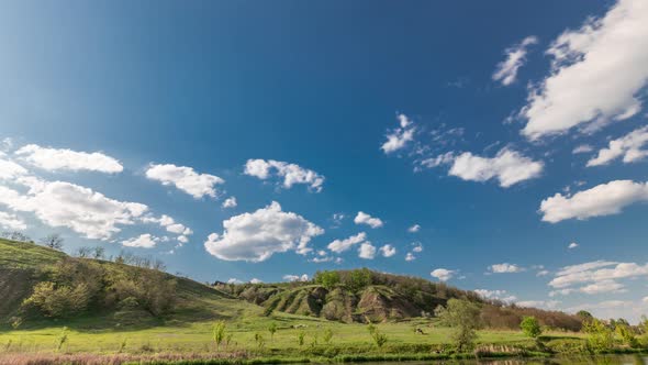 Green Field and Blue Sky with White Cloud Timelapse