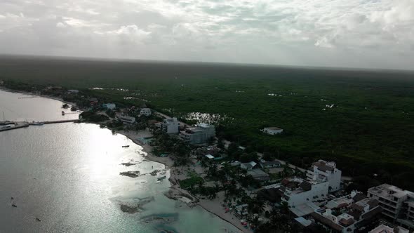 The sun reflected in the morning at the beach of Mahahual in mexico