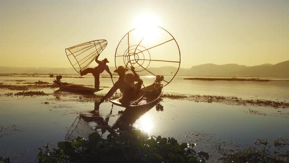 Fishermen with Fishing Net at Inle Lake in Myanmar