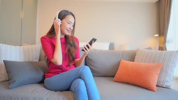 Woman use smart phone for listen music