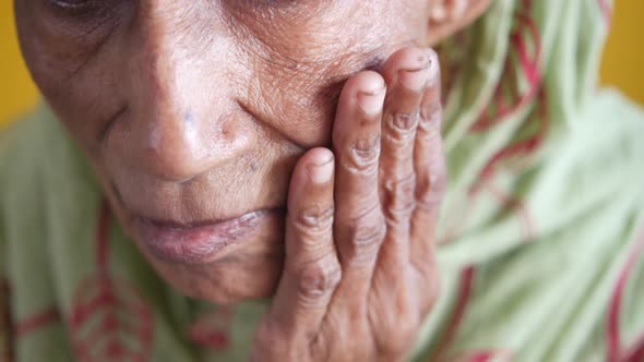 Senior Women with Sensitive Teeth Close Up