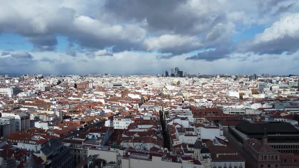 Aerial Shot of Madrid Housing Areas Clouds Sailing Over the City