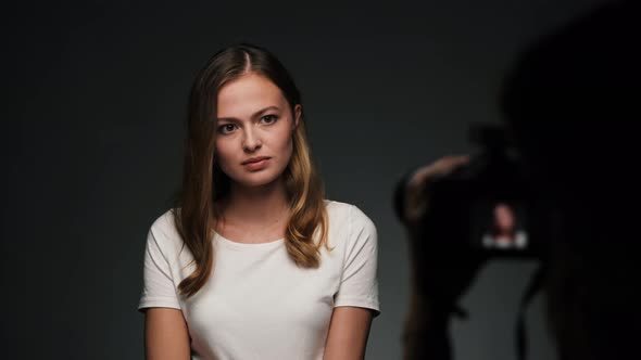 Portrait of Young Beautiful Caucasian Woman Posing for Photographer