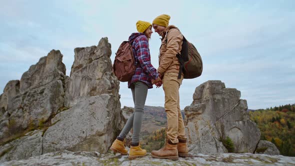 Couple Hikers Hipsters Stands on Autumn Landscape Background with Cliffs in National Park Tustan