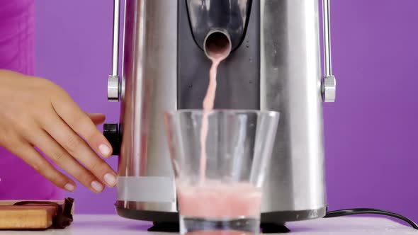 Woman preparing smoothie