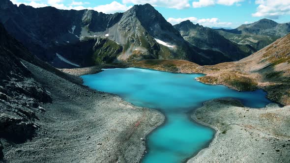 Insanely beautiful blue lake among huge rocks