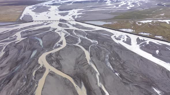 Aerial Drone View of Glacial River System of Iceland, Melt Water from Glaciers, Climate Change