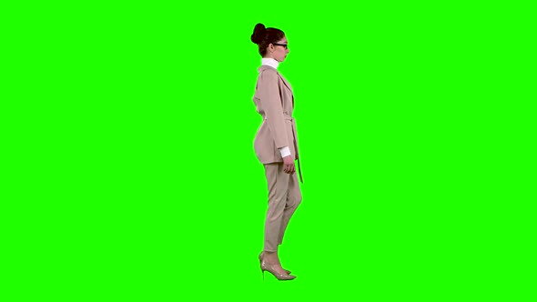 Businesswoman Flirting Correcting Glasses. Green Screen. Side View. Slow Motion