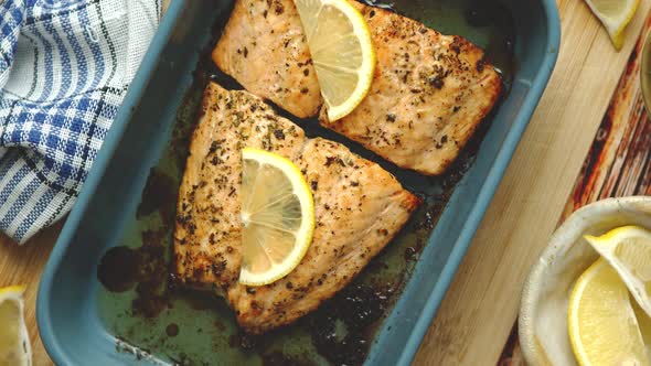 Close Up Shot of Healthy Grilled Salmon Served in Heat Proof Ceramic Dish