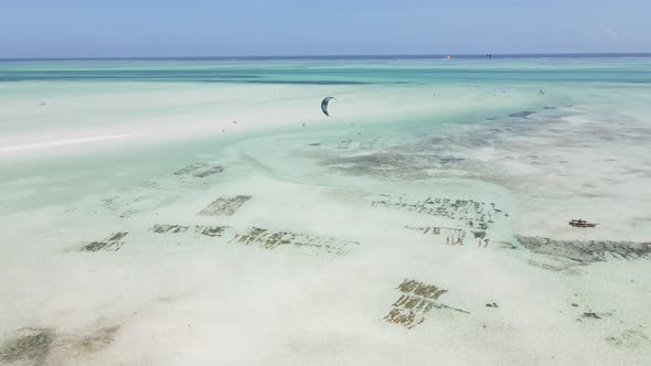 Kitesurfing Near the Shore of Zanzibar Tanzania