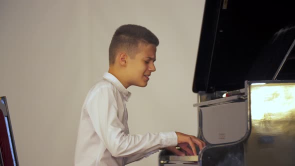 Boy Playing the Piano