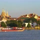 The Golden Grand Palace with the royal barge procession for The Thai King on Chao Phraya River - VideoHive Item for Sale