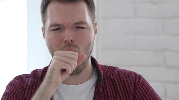 Portrait of Young Man Coughing Throat Infection