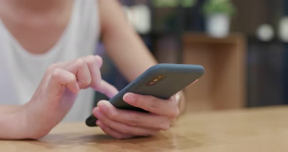 Use of mobile phone in coffee shop