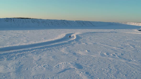 Aerial View of an Ice Rally on a Snowy Track