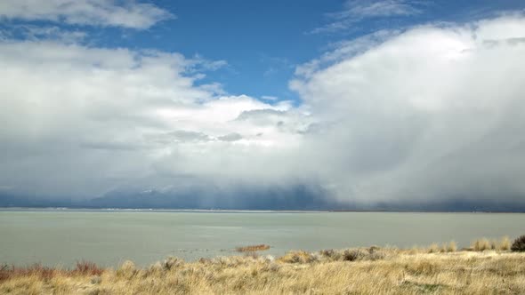 Low clouds moving over Utah Lake as it rains