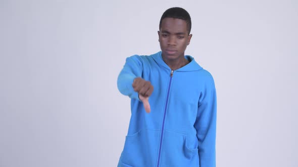 Young Angry African Man Giving Thumbs Down