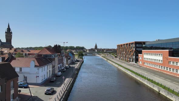 Calais, northern France. Aerial, Flying low above the canal with view on city center