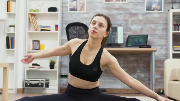 Carefree Caucasian Woman Reaching for Her Foot